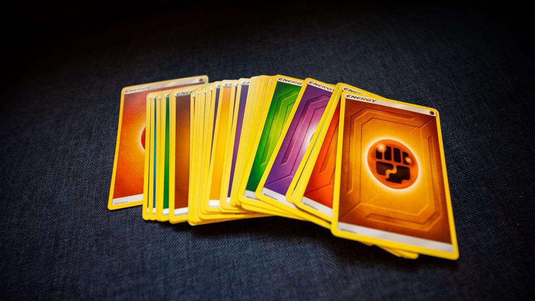 Pokémon TCG energy cards fanned out on a table