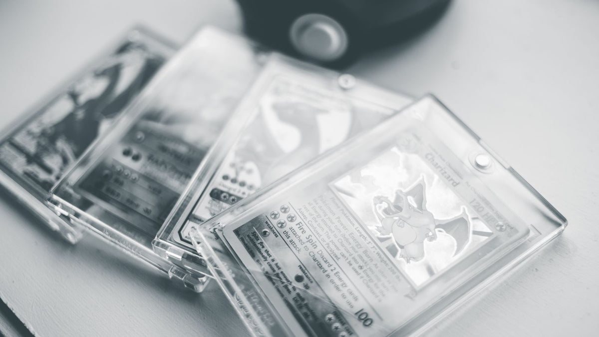 Graded Pokémon card slabs stacked together